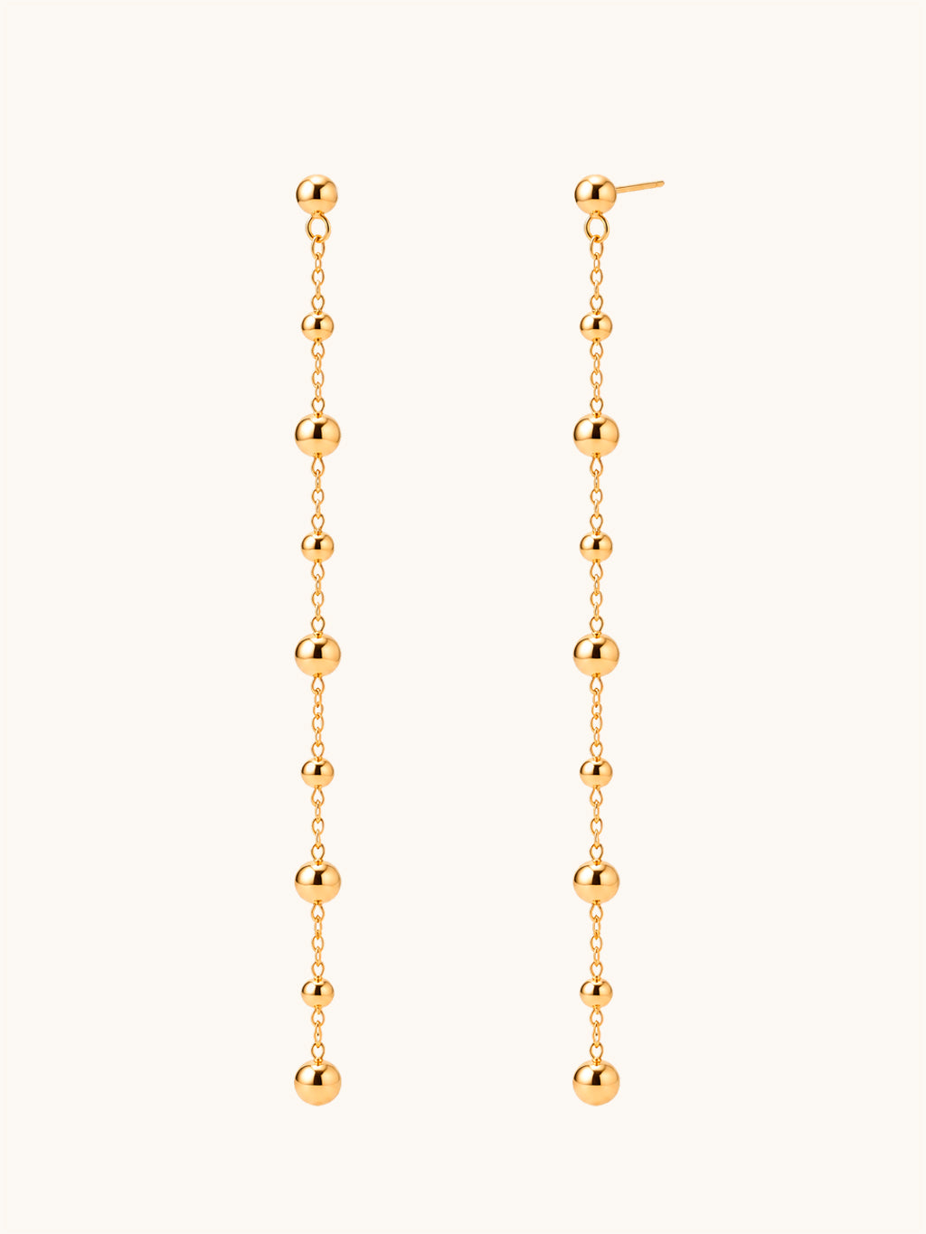 Lange vergoldete Kettenohrringe mit goldenen Kugeln