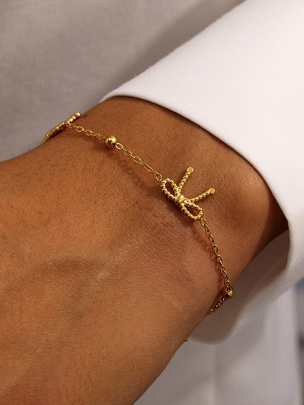 Tiny Bowtie Armband Gold - Dorose | Wasserresistent, kein Verfärben