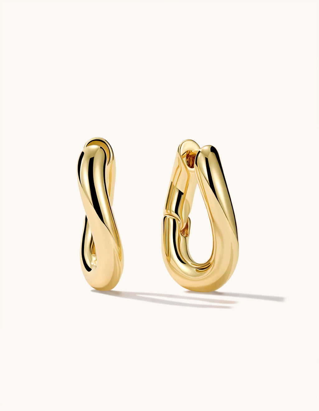 Wavy Huggie Hoop Ohrringe Gold
