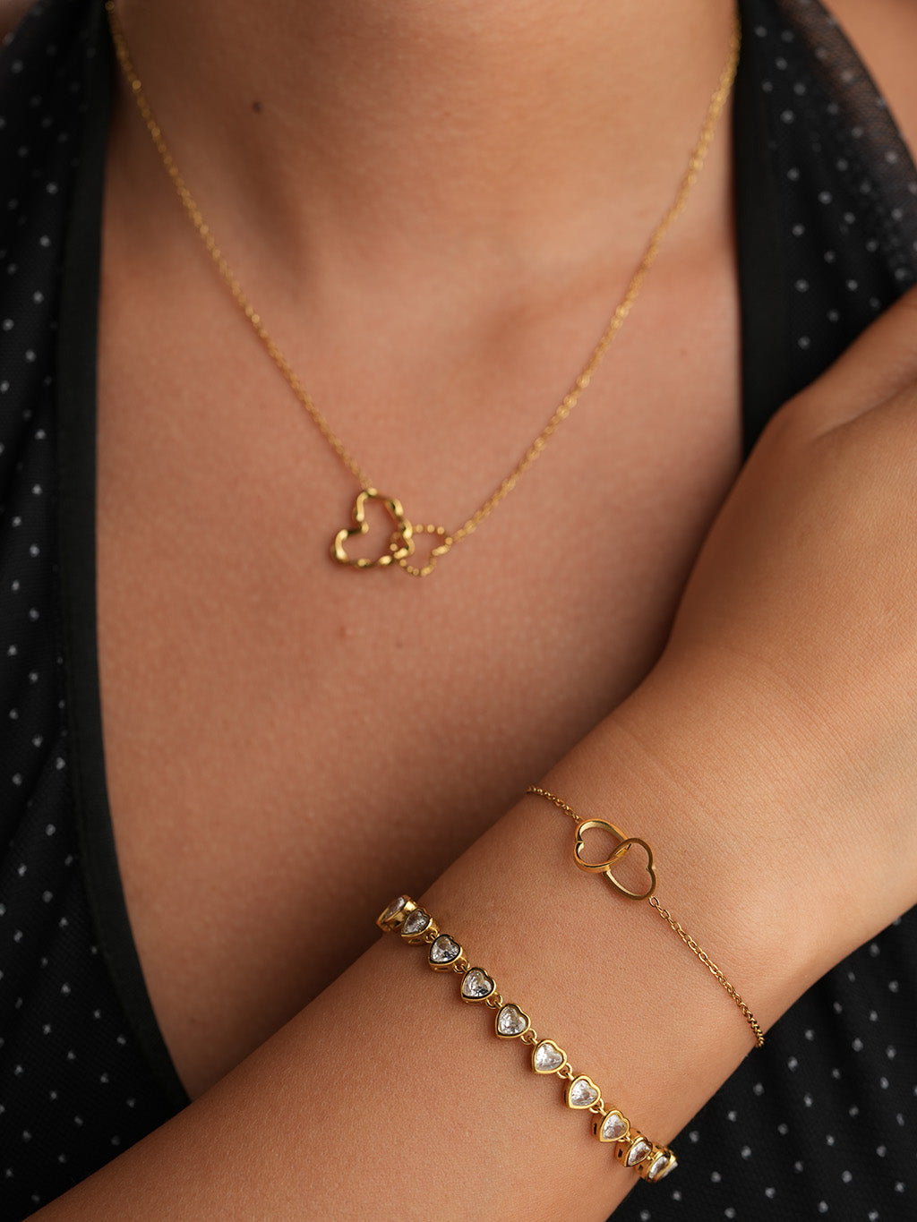 Verschlungene Doppelherz Armband Gold