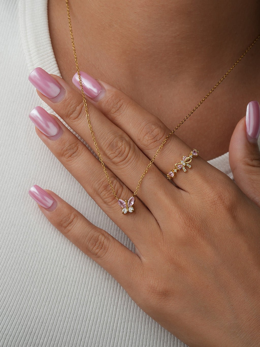 Goldener Schleifenring mit rosa Zirkonia - Dorose | Wasserresistent, kein Verfärben